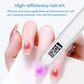 Handheld white LED nail drying lamp with screen, shown curing a single nail tip