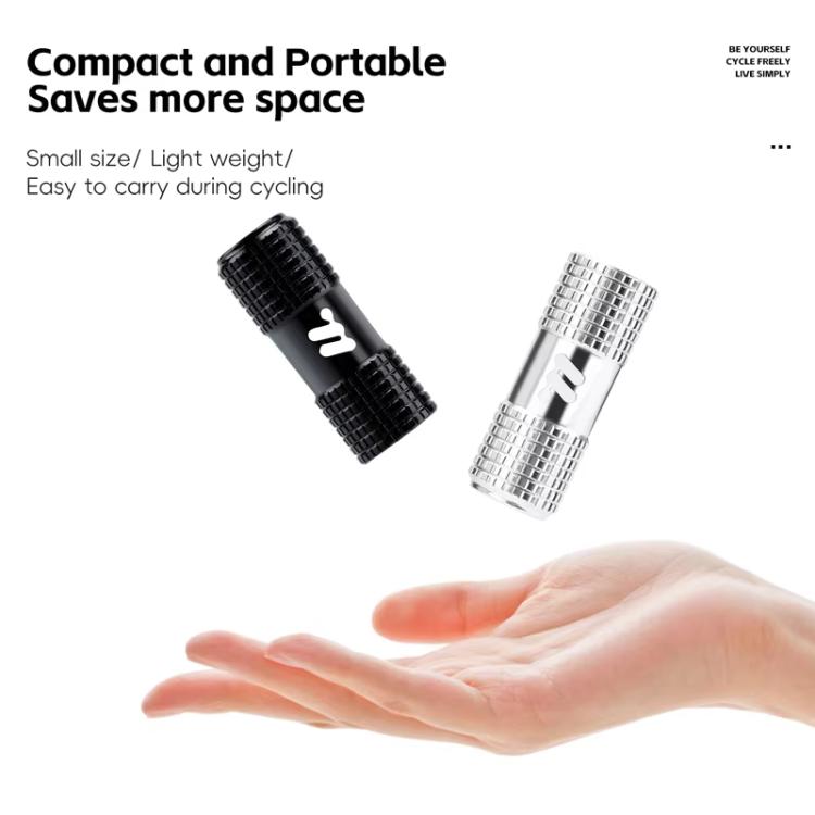 Compact CO2 inflator valve heads with foam sleeves, black and silver