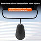 Black oval wiper repair tool hanging from the rearview mirror