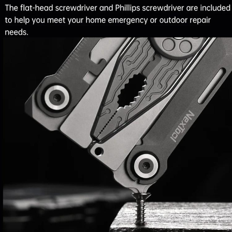 Close-up of silver folding multi-tool with flat-head and Phillips screwdriver bits