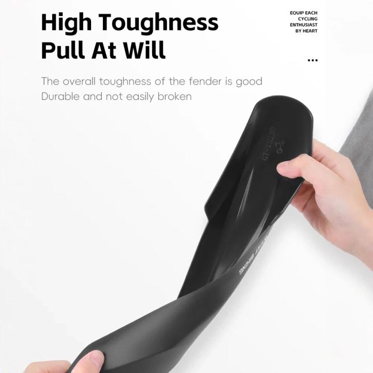 Black full-coverage bike fender held in hand, curved anti-splash guard