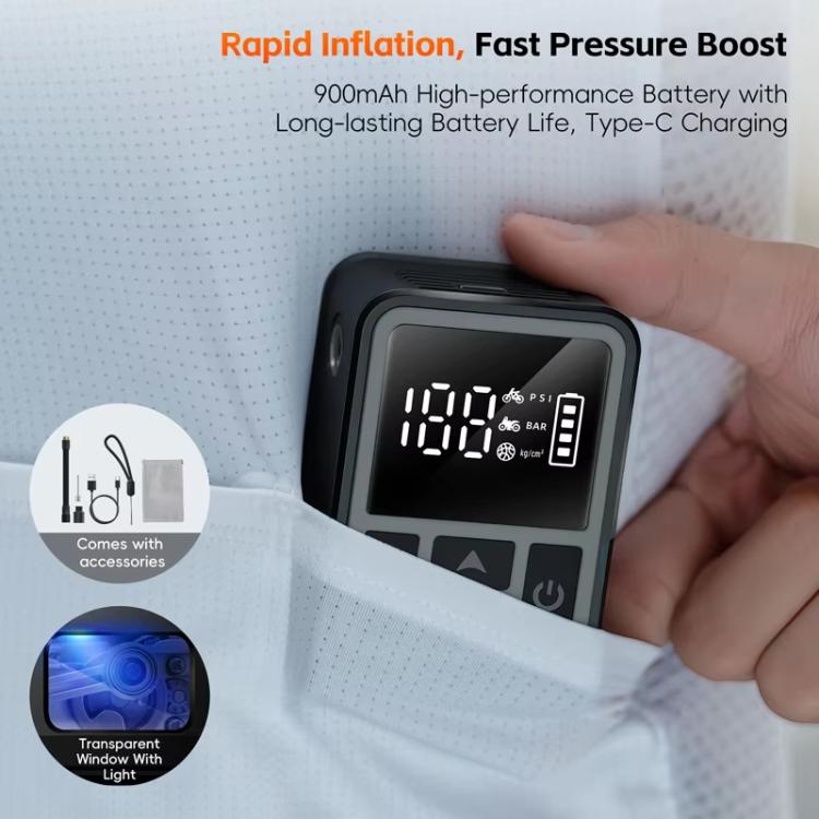 Black portable digital air pump inflator with screen visible while being hand-held to charge