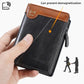 Men’s compact RFID leather wallet held in hand, black with tan trim and logo