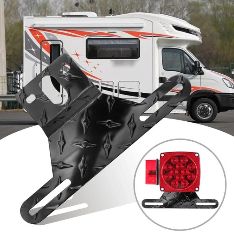 Trailer license plate light bracket with black mounting arms and integrated red LED light