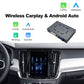 Wireless CarPlay and Android Auto interface module installed in car dashboard with screen on