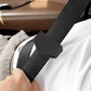 Car seat belt tension limiter pad on seat belt strap, black with red stitching