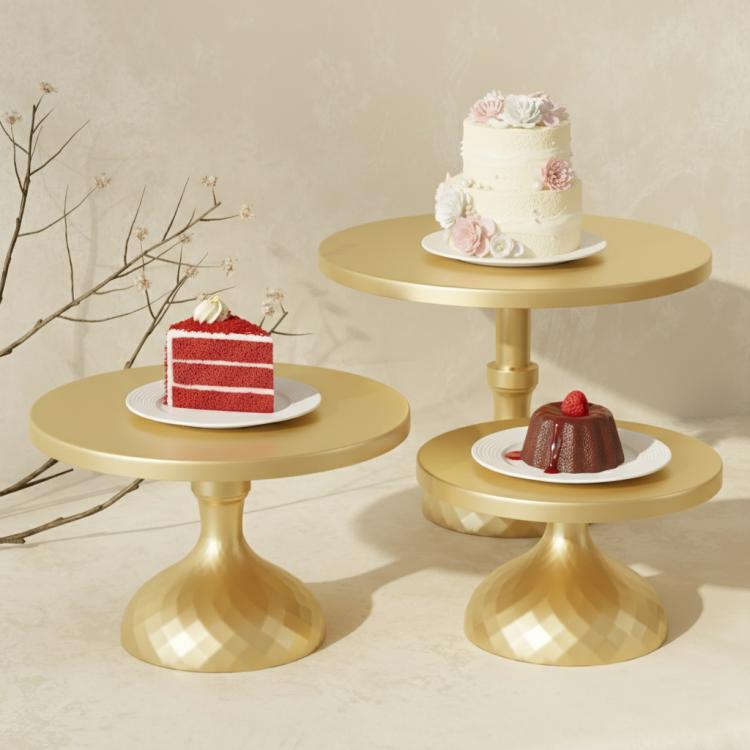 Gold tiered cake stand set holding cake and dessert slices on round plates