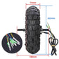 Off-road scooter tire with hub and size measurements, black tread with red rim ring