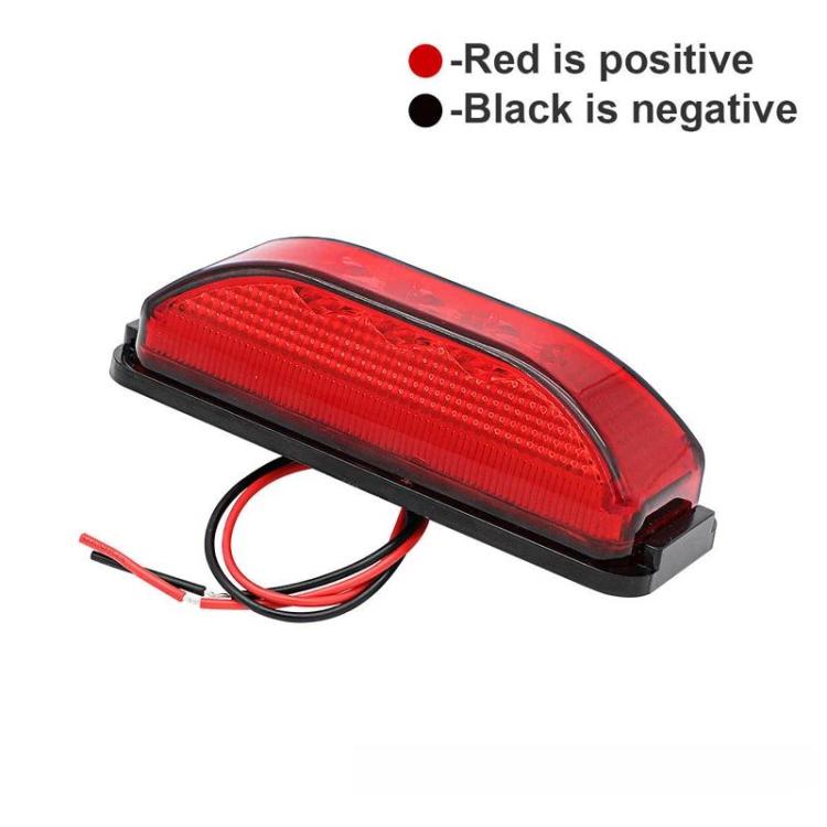 Red truck side marker light with black base and attached red/black wires
