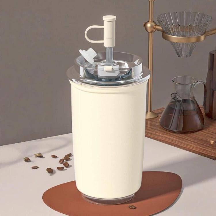 White vacuum-insulated 300 ml coffee cup with flip straw and carry handle