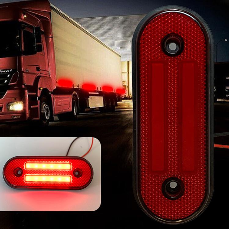 Red oval LED side marker lamp, showing two glowing rectangular light strips