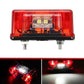 Waterproof LED license plate light with red translucent cover, visible LED circuit, and mounting bolts