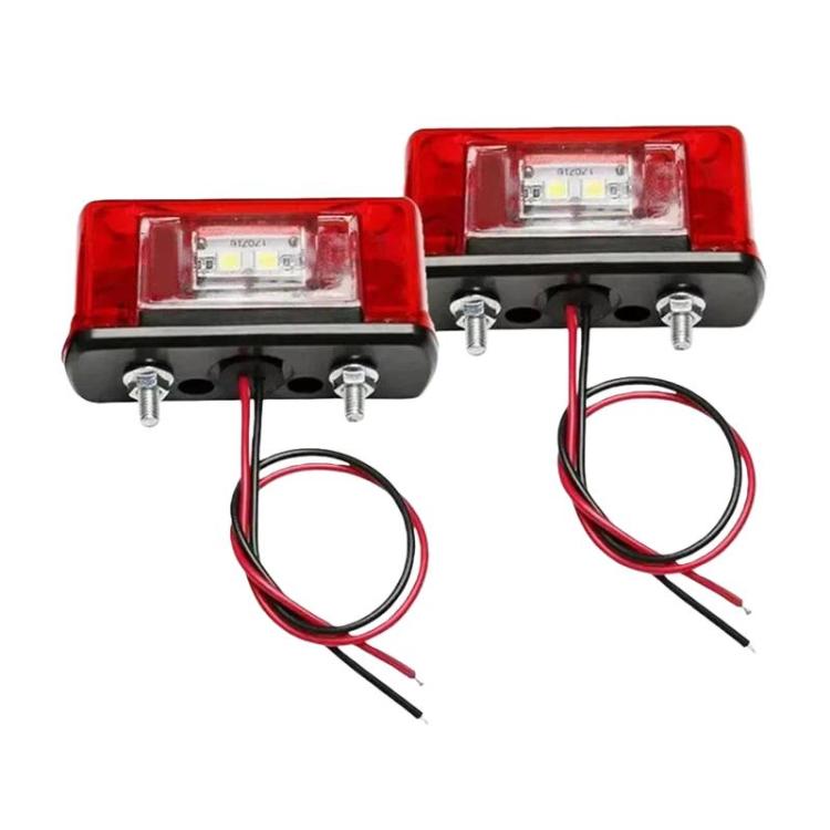 Set of two waterproof LED license plate lights with red covers, wiring leads, and mounting screws