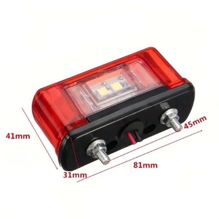 Waterproof LED license plate light with red housing, clear lens, and two mounting screws