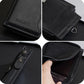 Black leather compact wallet shown from multiple angles, with zipper and key ring