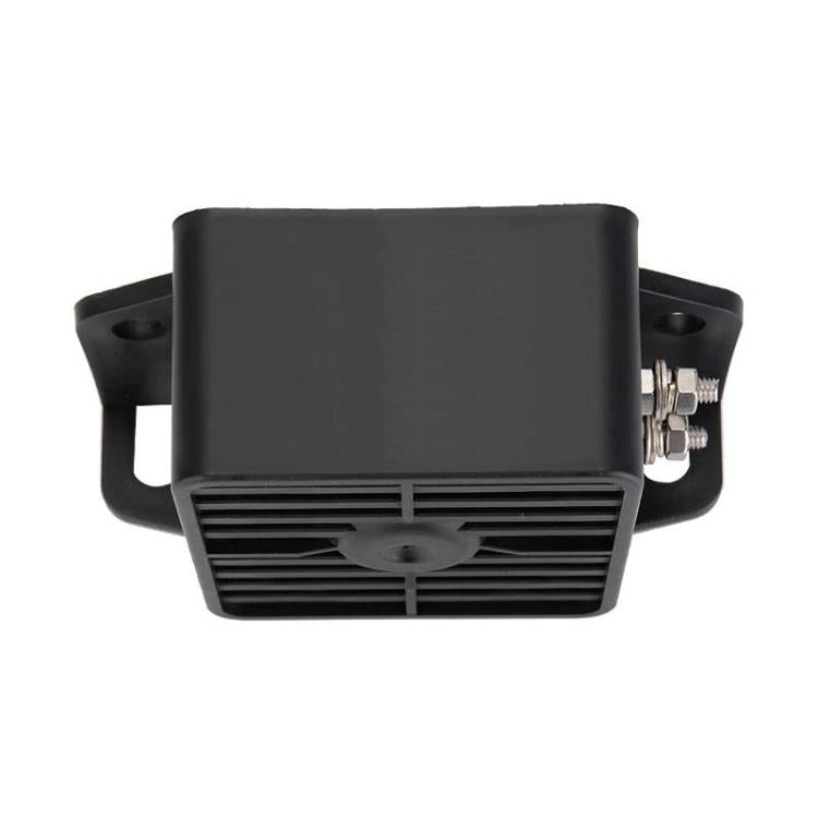 Black waterproof reversing alarm with rear vented grille and side screw terminals