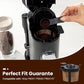 Reusable coffee maker mesh filter with handle, filled with dark coffee grounds