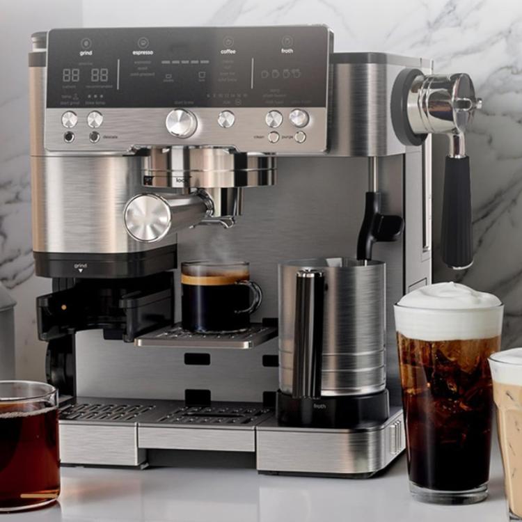 Black handle storage rack mounted on espresso machine side