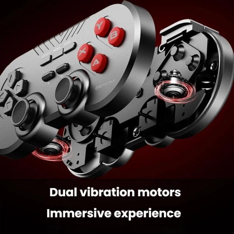 Wireless game controller with exposed vibration motor area and ABXY button layout