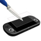 Tempered glass screen protector being applied with tool to handheld console screen