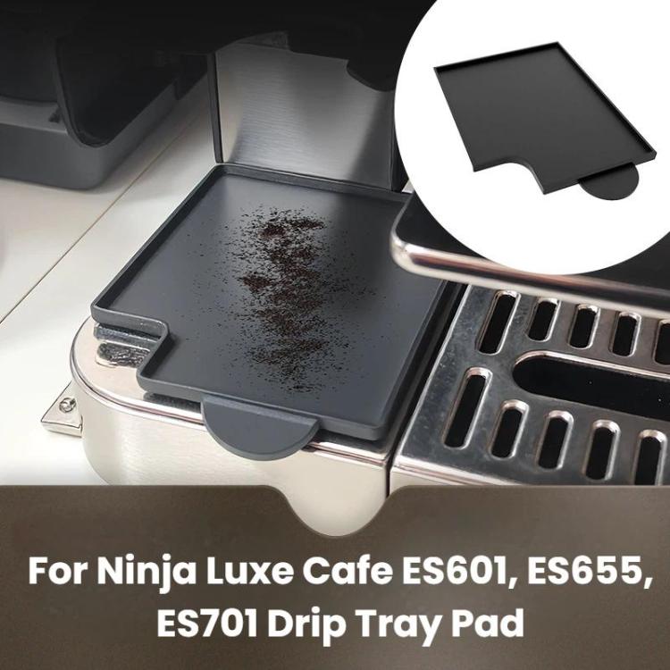 Coffee grounds catcher mat for drip tray, placed under a coffee machine’s spout area