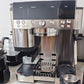 Coffee grounds catcher mat installed on a coffee machine drip tray, dark gray