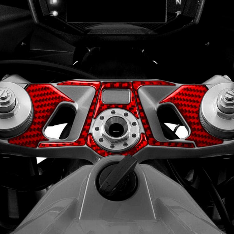 Black and red carbon-fiber style interior trim sticker set on motorcycle panel