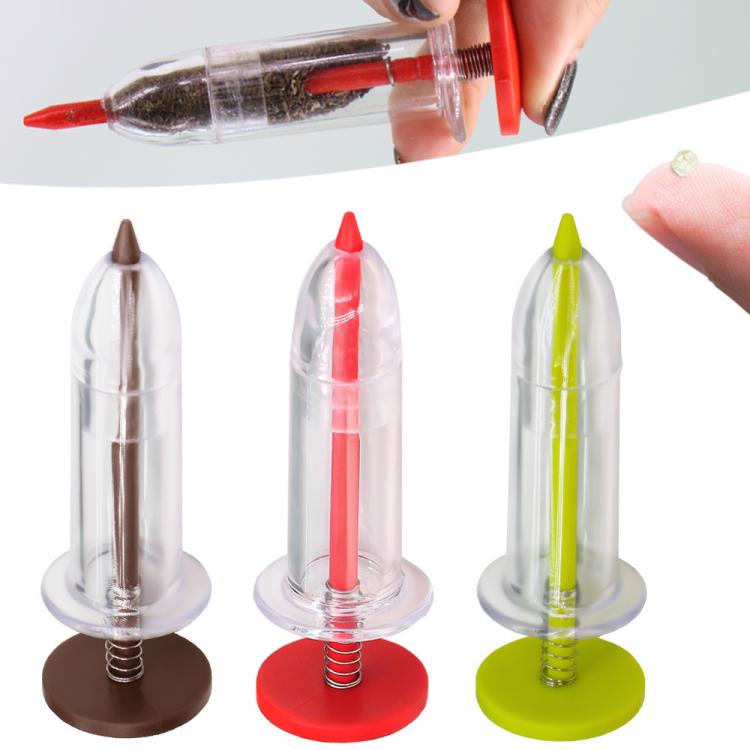 Set of three clear syringe seed planters with red and green bases and tips