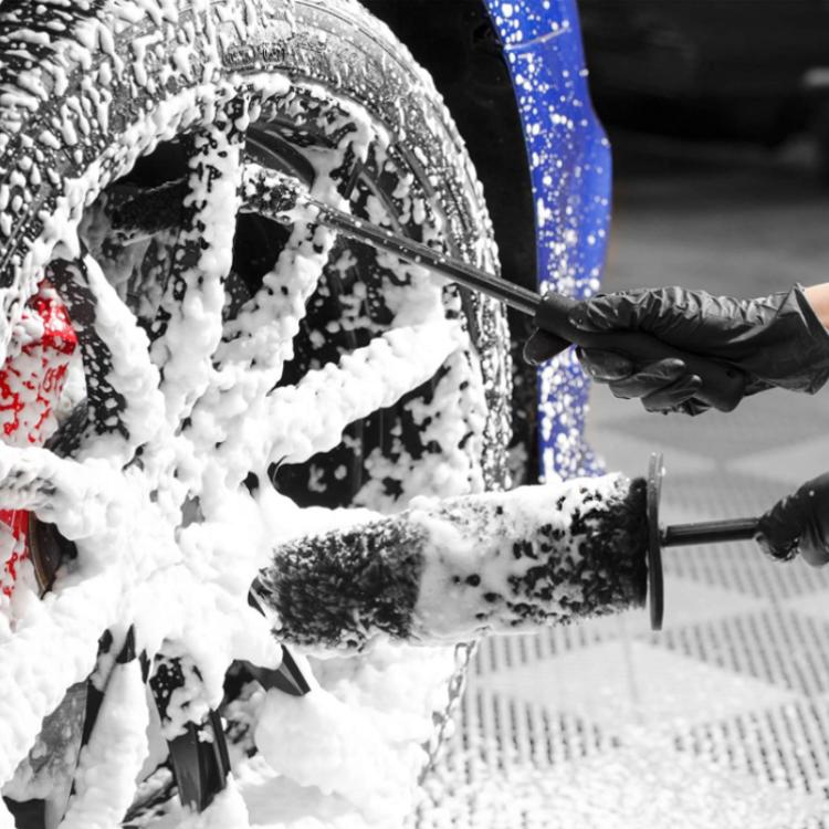 Handheld wheel hub cleaning brush with gray abrasive head for scrubbing wheel crevices