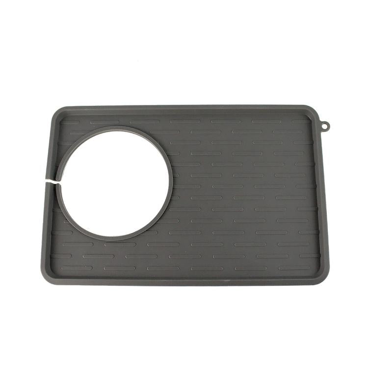 Grey silicone anti-slip mat with round port cutout and side hanging loop