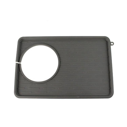 Grey silicone anti-slip mat with round port cutout and side hanging loop