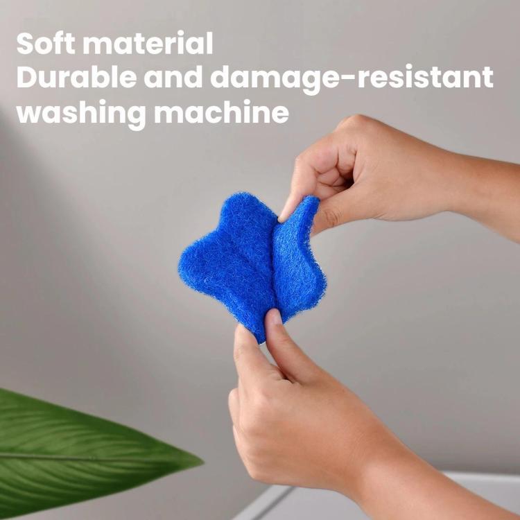 Blue felt star-shaped lint remover pad in hands