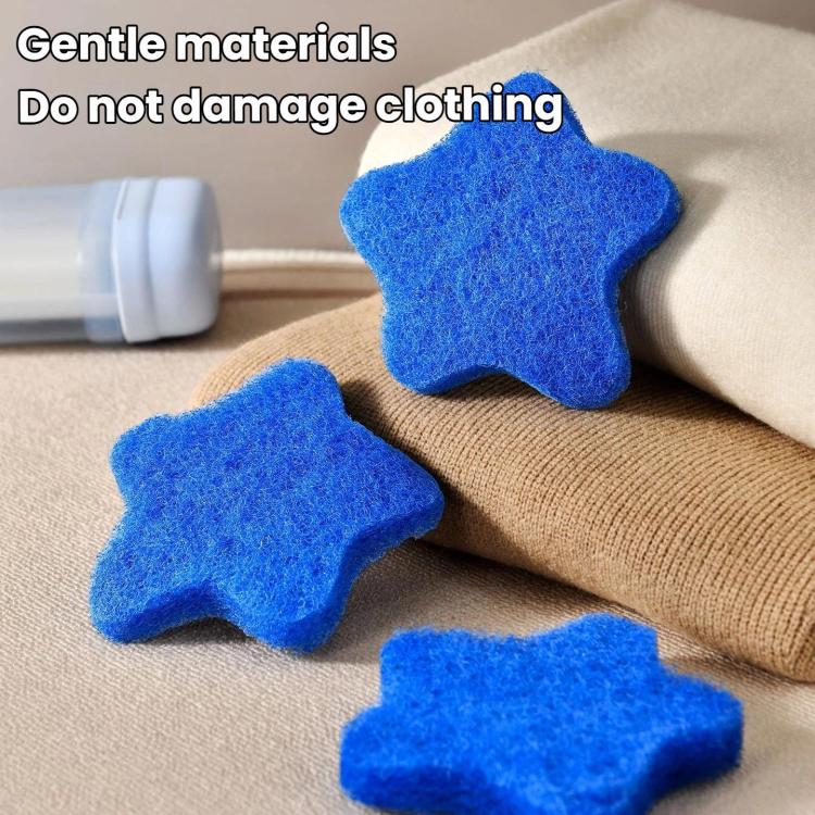 Blue felt star-shaped lint remover pads on a fabric surface