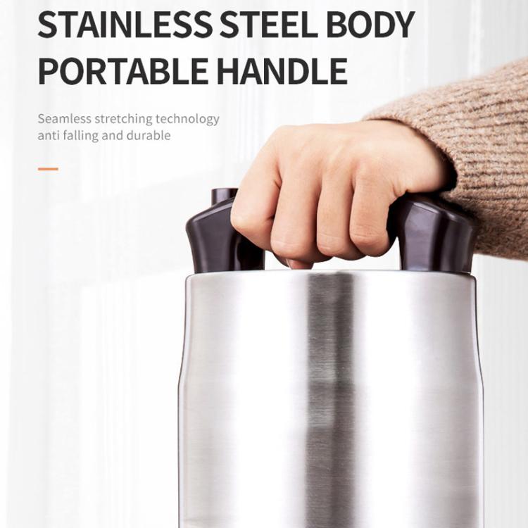 Stainless steel grinder body with portable handle held in a hand