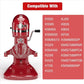 Stainless steel whisk attachment mounted on a red KitchenAid stand mixer