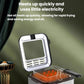 Electric deep fryer heating basket with visible oil glow, lid open