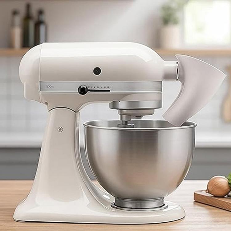 White flour funnel attachment fitted to stand mixer with side chute
