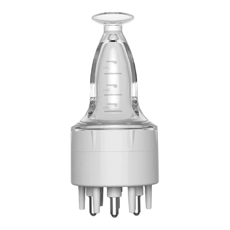 White scalp serum applicator with roller massage comb and multiple dispensing tips