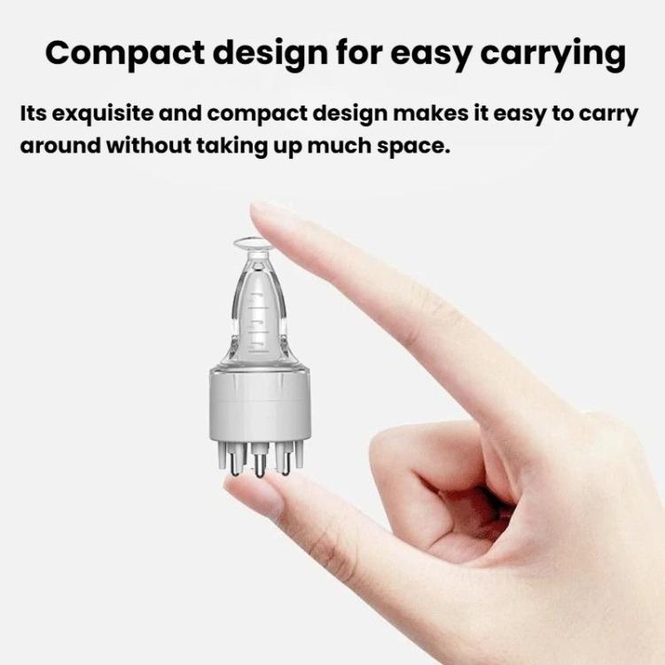 Compact clear scalp serum applicator with white base held in a hand