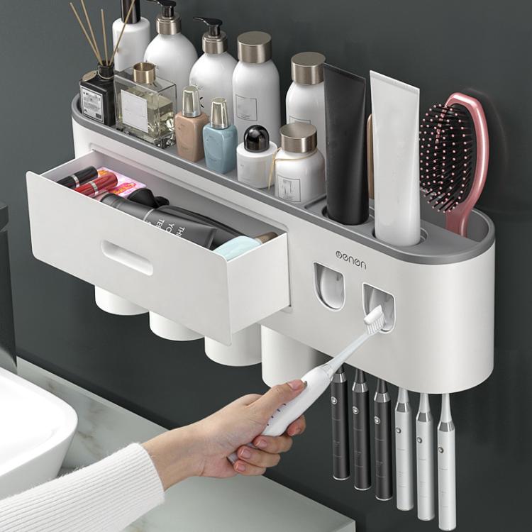 White bathroom toothbrush holder with pull-out drawer and cup storage for grooming tools