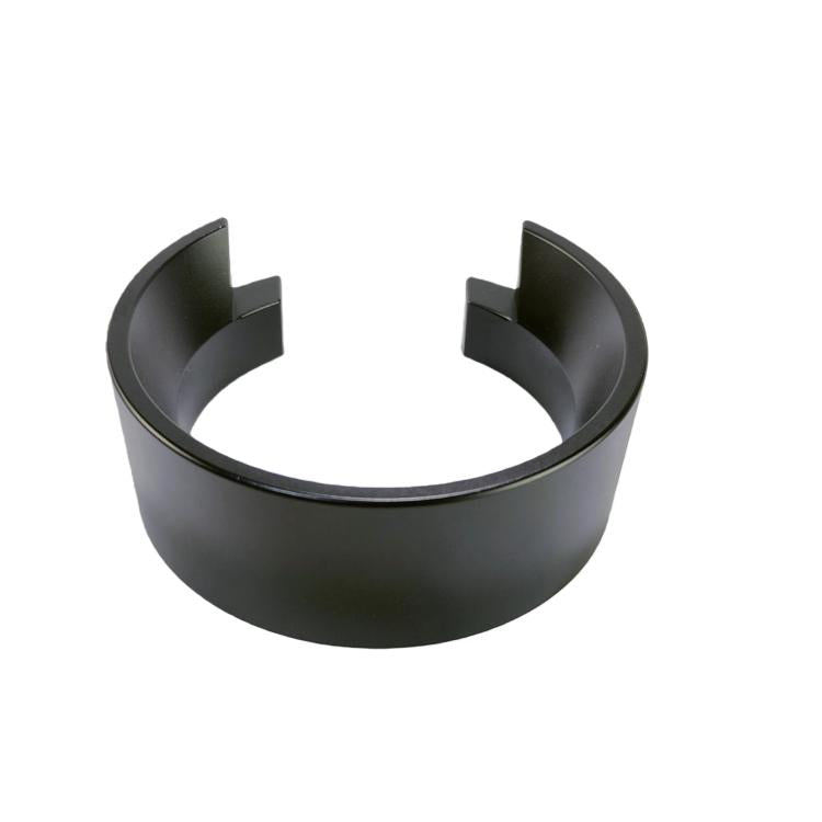 Black magnetic dosing ring with two raised tabs for coffee grinder funnels.