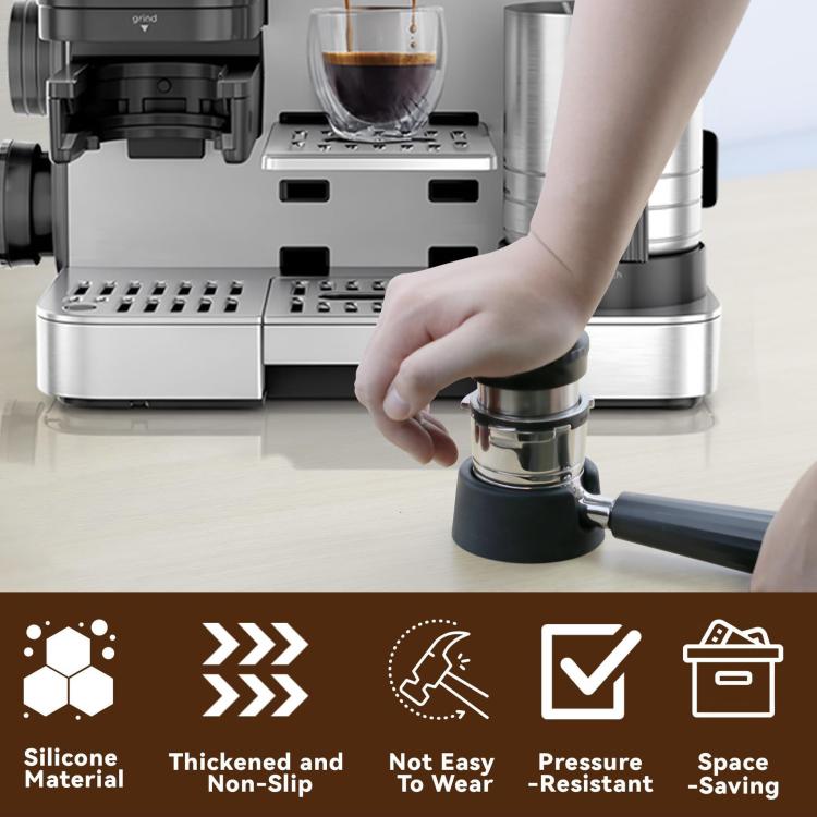 Black tamping base stand with portafilter in place on a coffee machine station