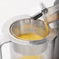 Stainless steel perforated cone strainer filter, with juice flowing through mesh