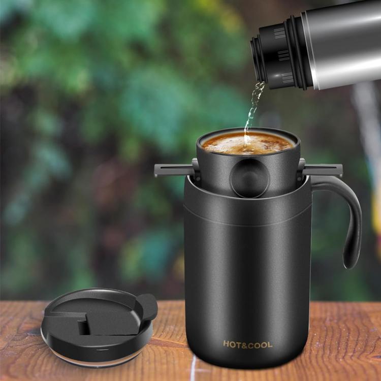 Black insulated coffee maker cup with drip brewer and snap-on lid