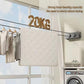 Gray retractable wire clothesline drying rack wall mount with hanging laundry