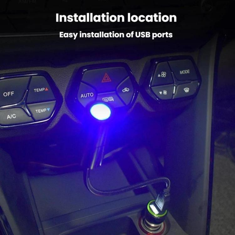 USB car interior projection light installed near dashboard controls