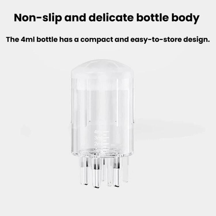 Clear scalp medicine applicator with prongs and cylindrical white bottle cap