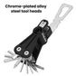 Black bike repair multi-tool with chrome tool heads and folding hex/flat wrenches