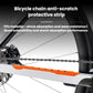Orange bike chain anti-scratch protective strip on lower frame near chain