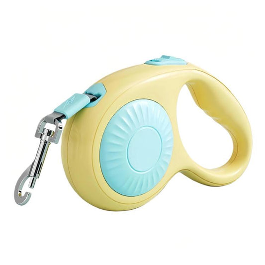 Automatic retractable dog leash, light yellow case with blue circular button and metal hook